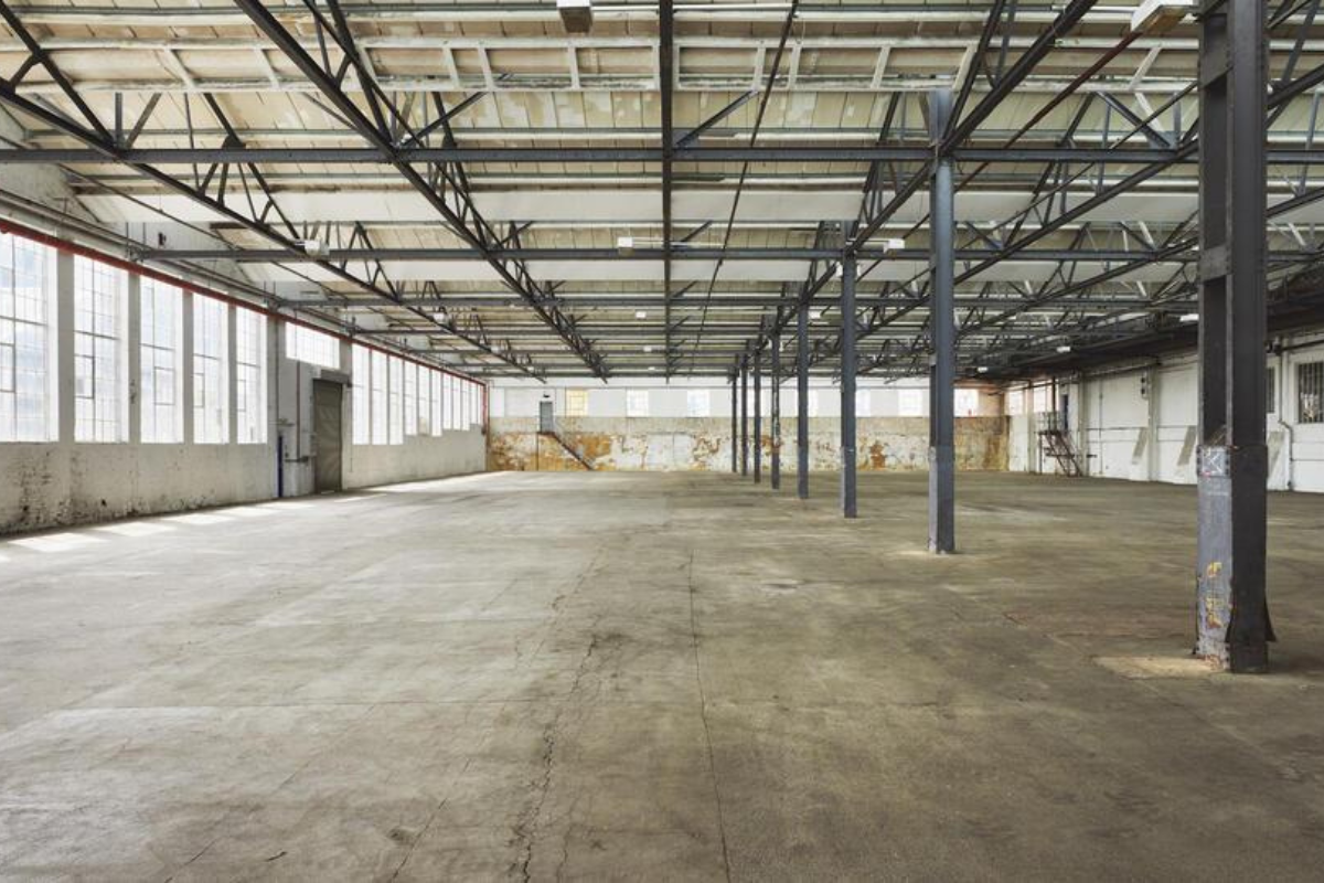 Industrial warehouse interior with structural steel framing