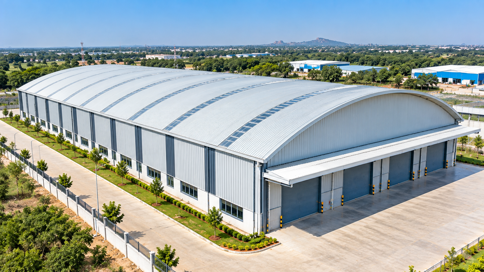 Warehouse with curved roofing system