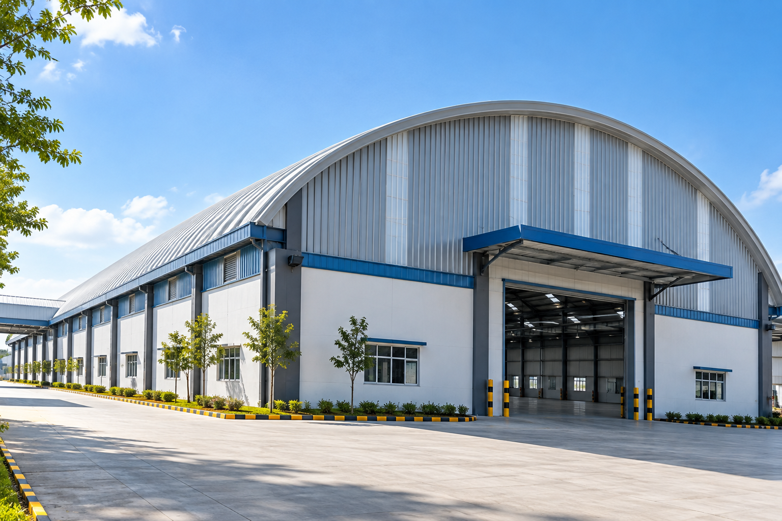 Illustrative curved Trussless Roofing System for an industrial building