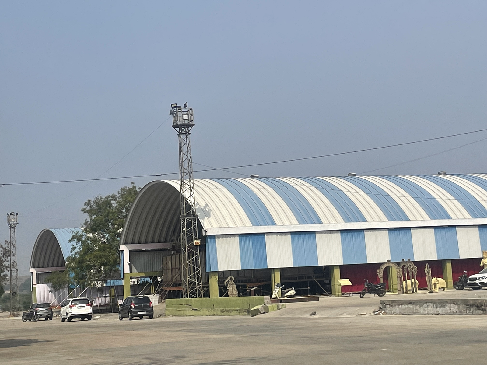 Broad view of the industrial building roof showing the overall roof form.